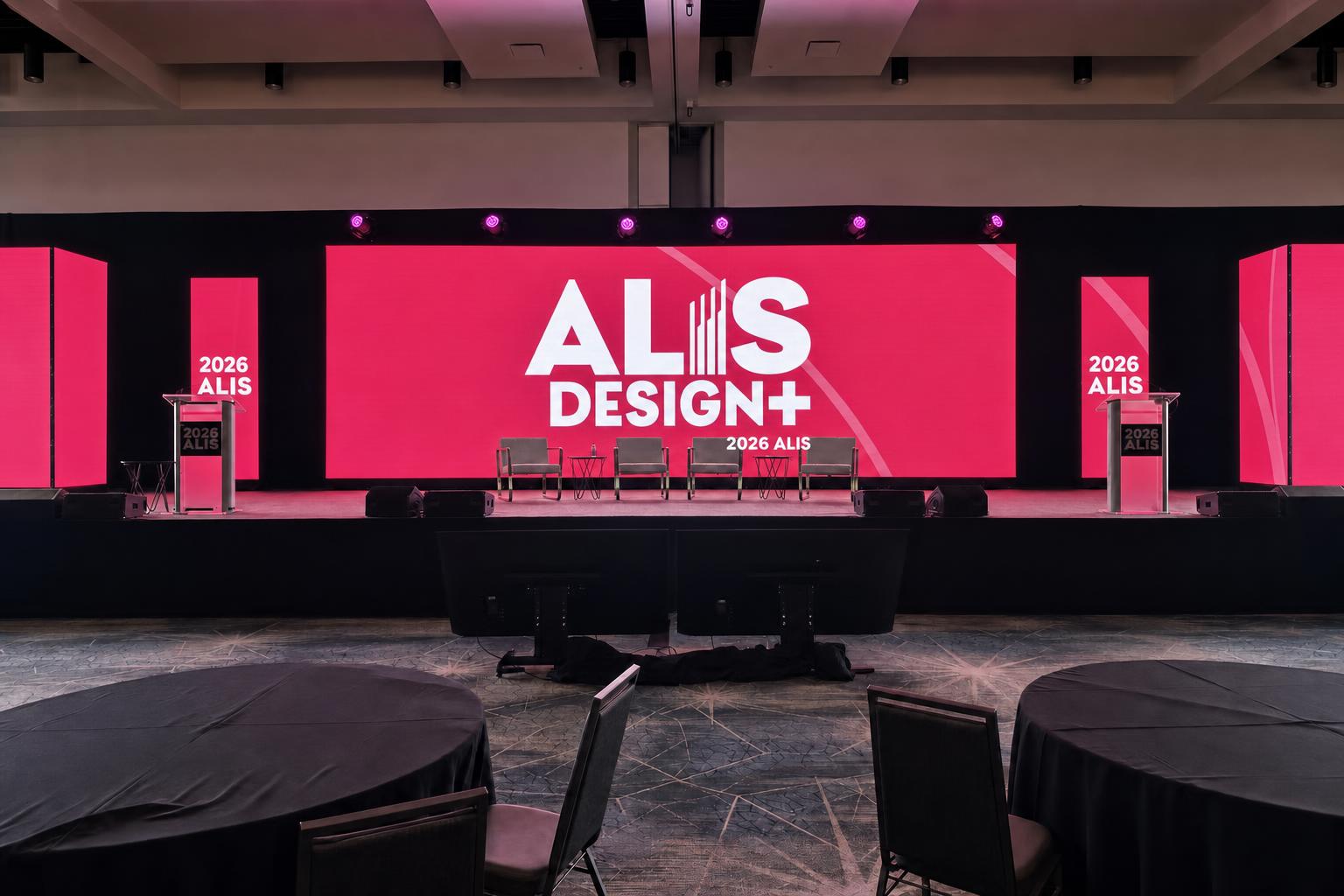 Stage scenic and lighting design rigging above a corporate ballroom